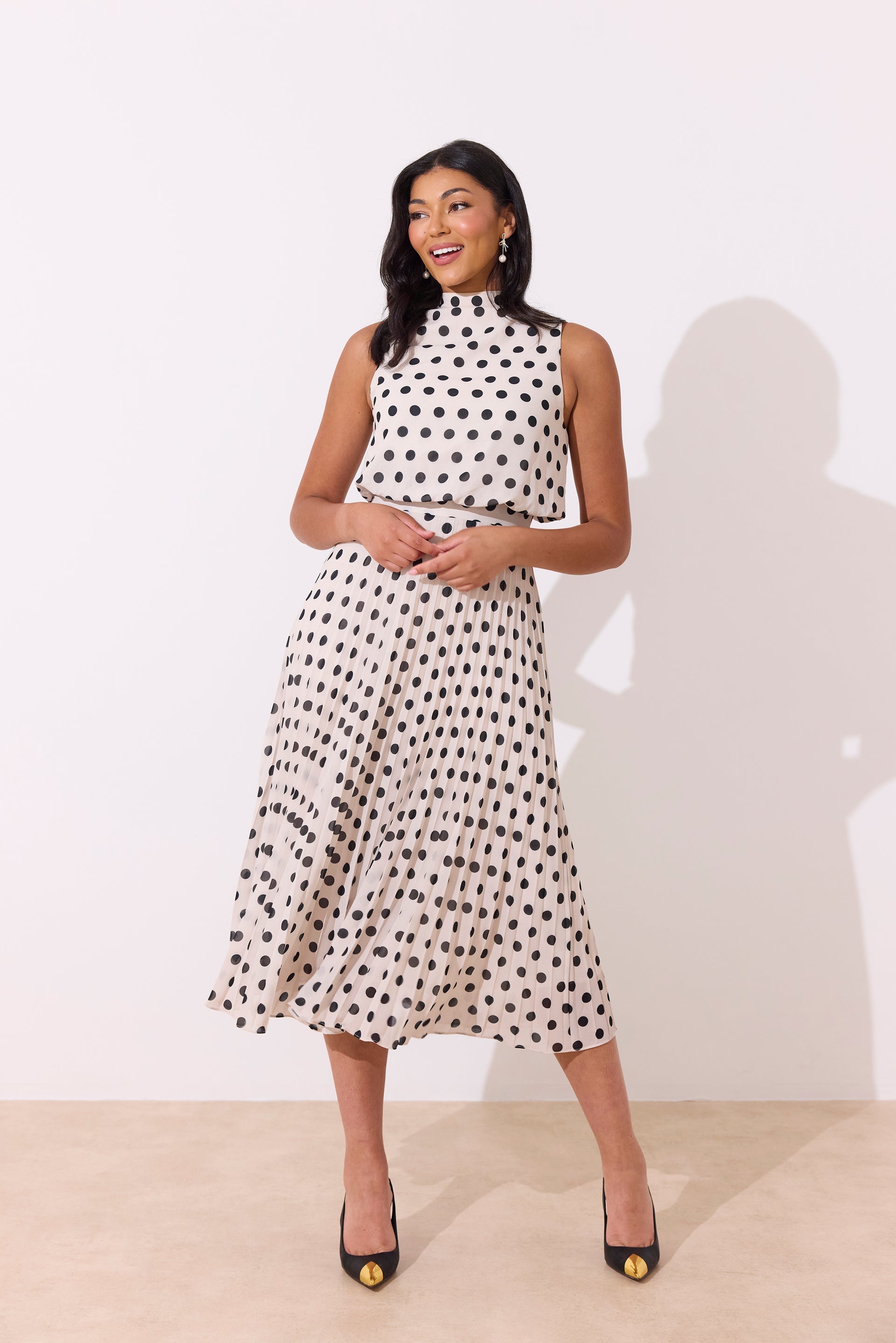8th Sign Milly Polka Dot Midi Dress front view with pleated skirt