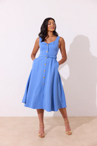 8th Sign Saffira blue A-line midi dress front view with gold button detail