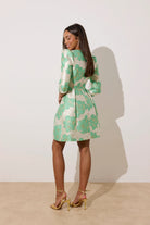 8th Sign Veronica floral brocade mini dress back view with bell skirt