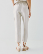 Back view Silver-tone shimmer trousers with elastic waist and fluid silhouette