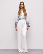 Full-length view of Access Fashion grey gradient wrap shirt with wide-leg trousers