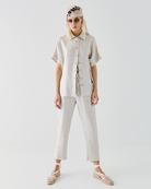 Ladies Relaxed fit shimmer shirt with batwing sleeves and subtle shine