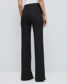 Access Fashion high waisted black flared trousers back view.