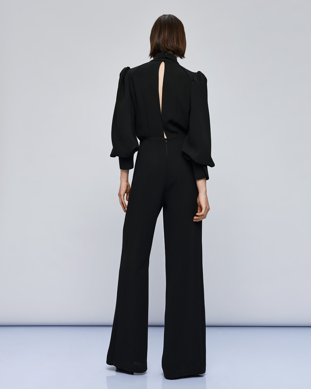 Access Fashion Black Puff Sleeve Jumpsuit from the back 