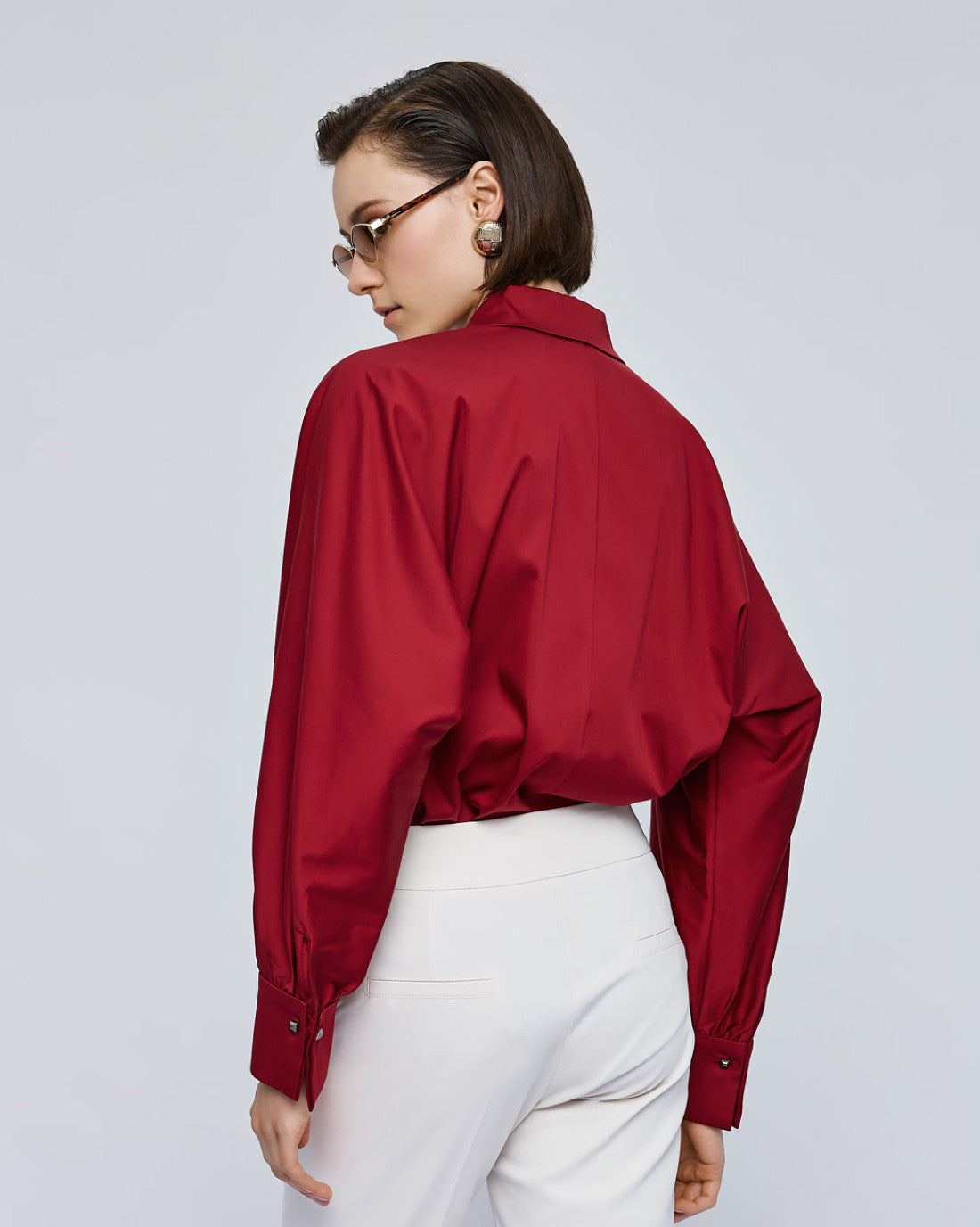 Back view of Access Fashion red wide sleeve shirt