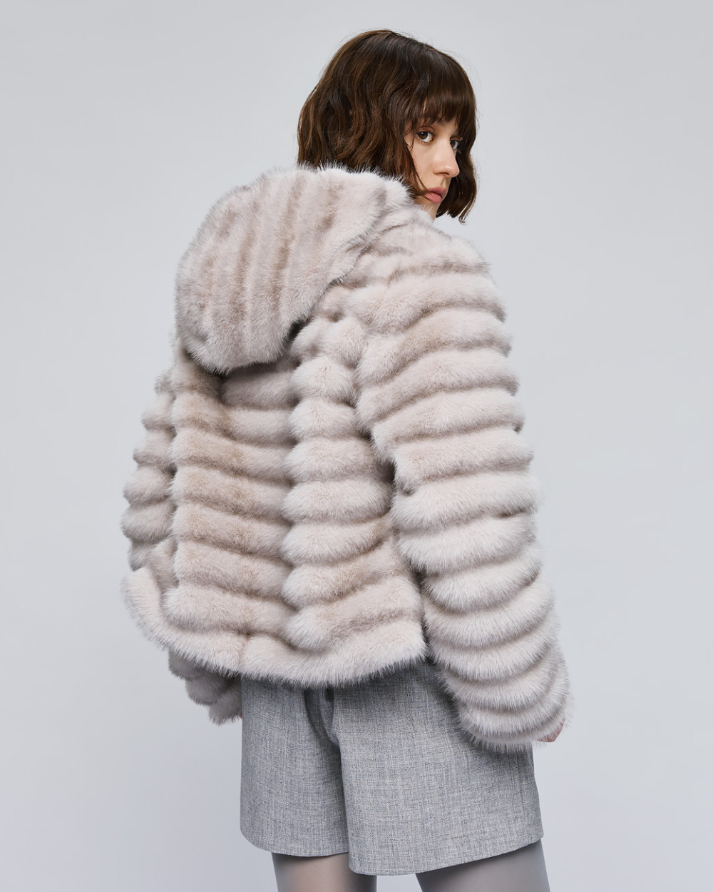 Access Fashion grey faux fur jacket with hood – back view showing striped texture.