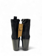 Back view of Alpe black suede ankle boots with easy on pull tabs