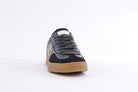 Another Trend black retro trainers with bronze side logo front view