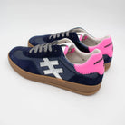 Close-up of metallic pink heel on Another Trend navy suede women’s trainers