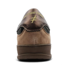 Back view of Another Trend Tostado Beige/Black trainers with gold detail and bronze heel