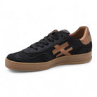 Side view of Another Trend Iconic Trainers in black pony-style leather with bronze accents and rubber sole