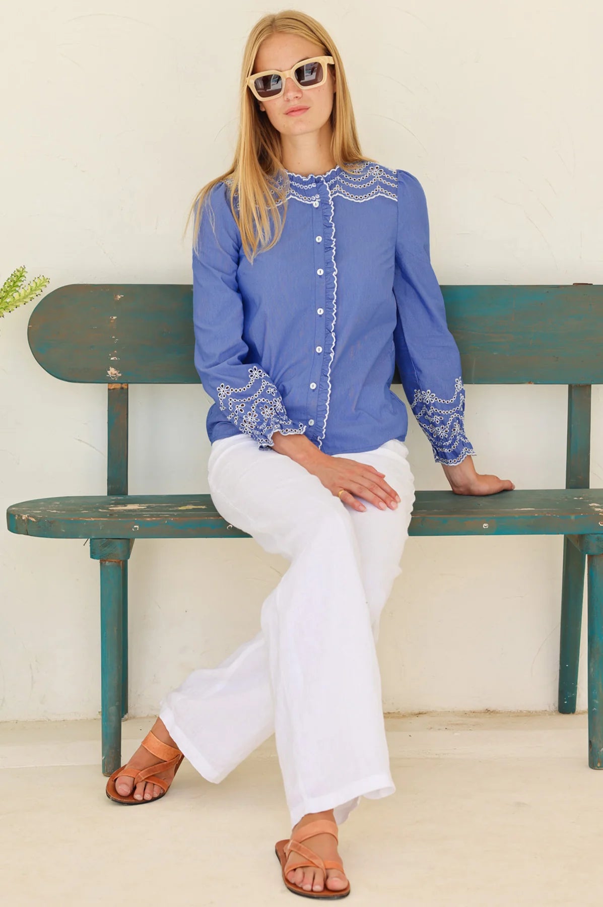 Aspiga blue embroidered shirt full length front With white jeans  