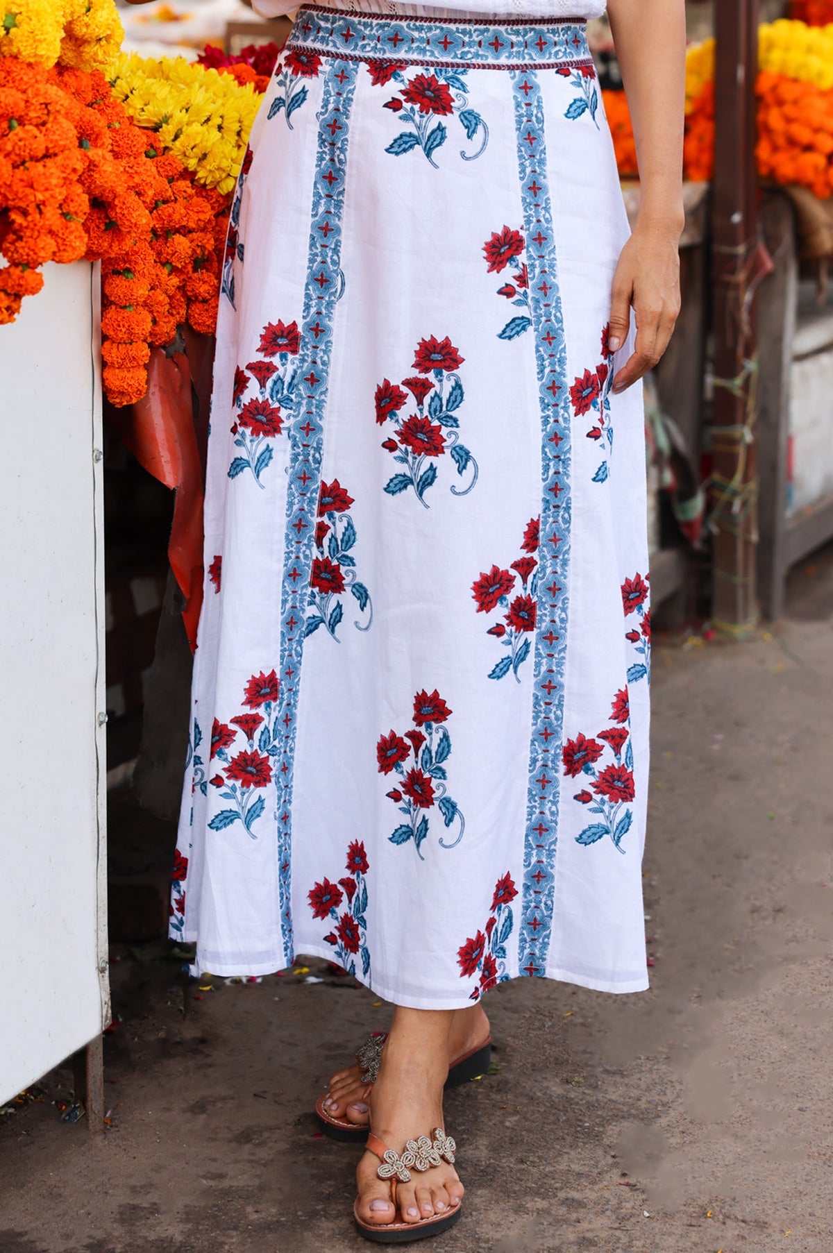     Florrie floral skirt border detail blue and red print close up