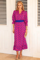     Aspiga blue pink print midi dress side view with tie belt