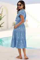 Aspiga Riley organic cotton embroidered midi dress walking back view