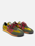 Back 70 Rocket green and red retro trainers – angled pair view