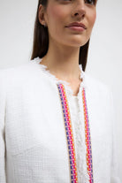 Bariloche Acebo ivory tweed jacket with fringe neckline and rainbow ribbon front trim
