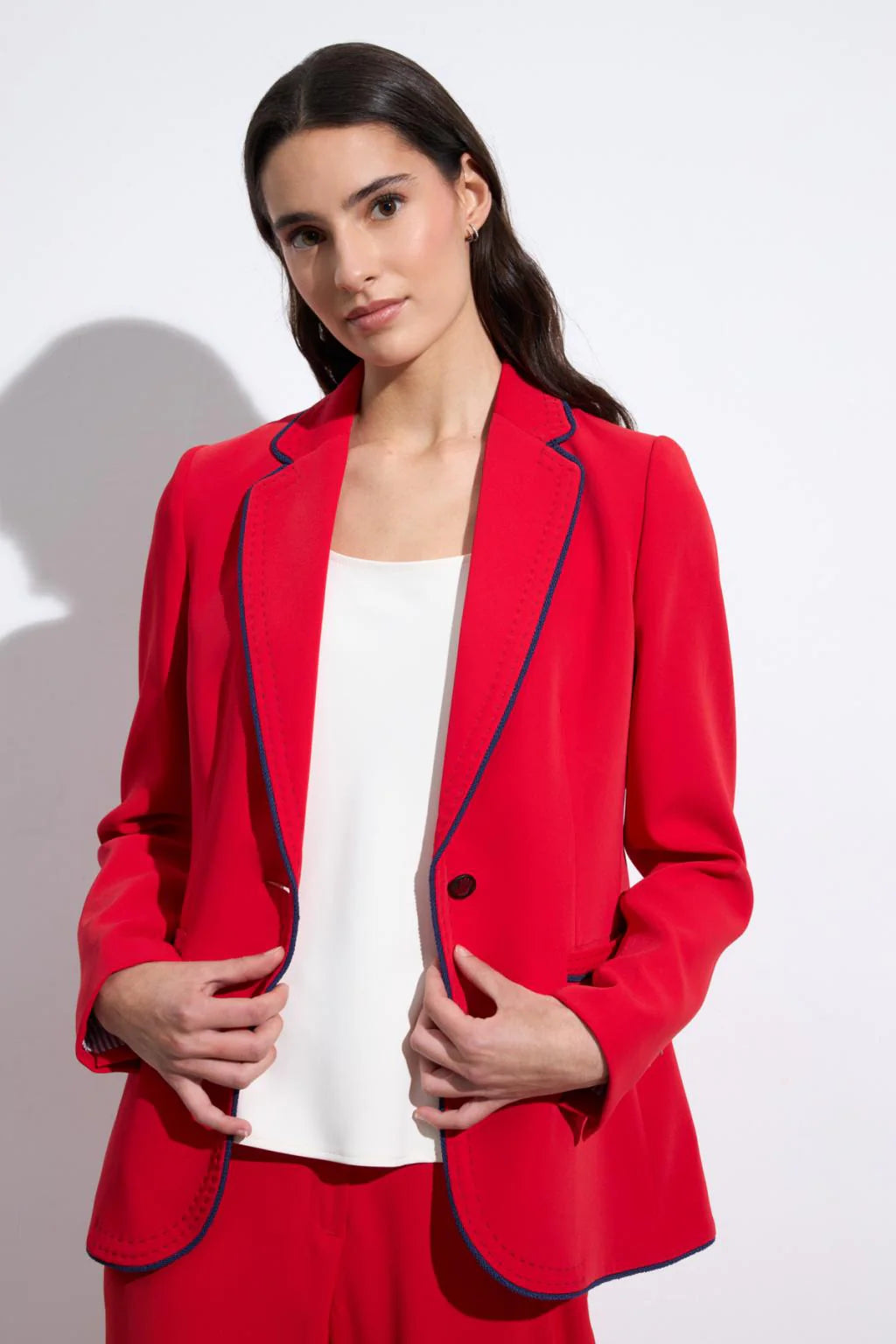 Bariloche Aljariz red blazer contrast blue lapel piping detail