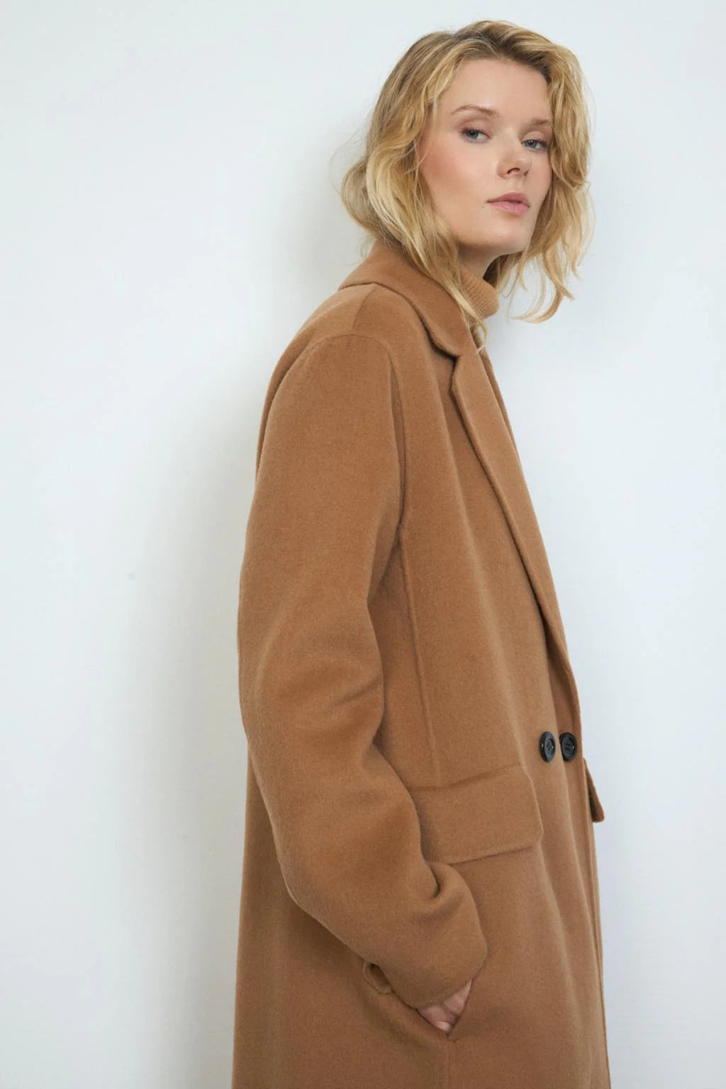 Bariloche Caraca long wool-blend coat in camel — side profile view