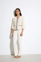 Bariloche Carrascal tweed fringed jacket styled with trousers