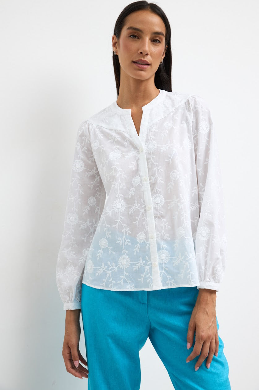 Bariloche Clavel white embroidered flower blouse front view relaxed fit
