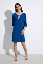 Bariloche Diamante blue shift dress with flute sleeves and silver bar neckline detail