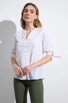 Bariloche Flores embroidered cotton daisy blouse side view