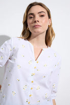 Bariloche Flores daisy embroidered cotton blouse detail