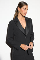 Bariloche Fos black tailored tuxedo blazer with satin lapels front view on model