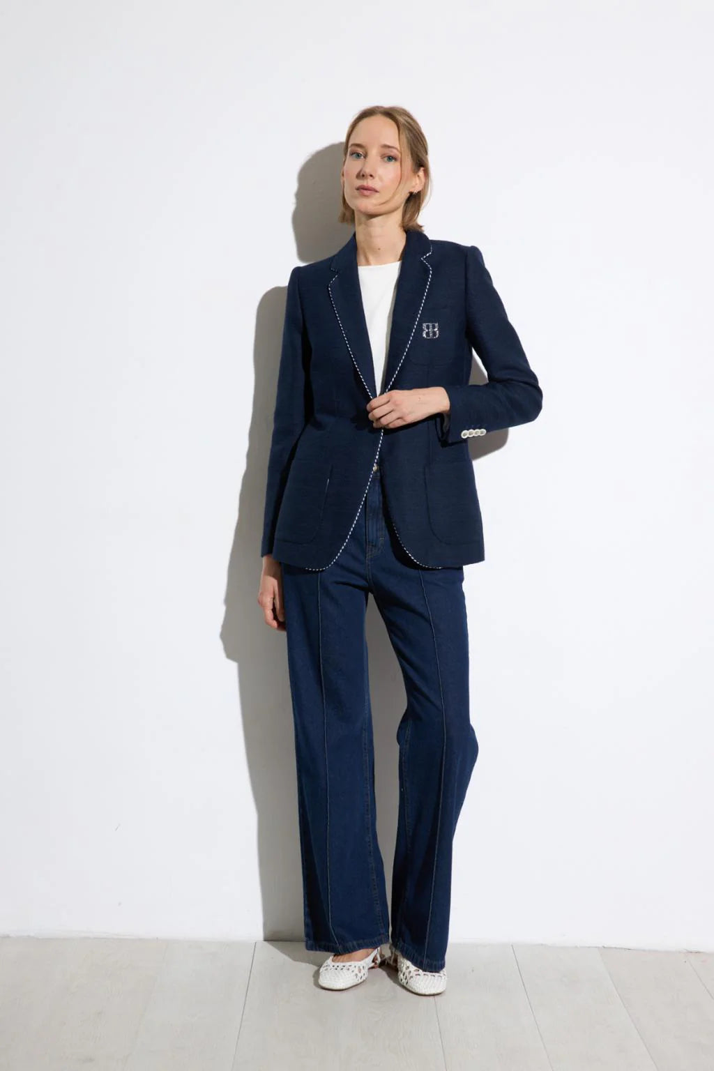 Bariloche Hidra navy blazer styled with matching trousers