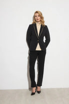 Bariloche Luncaria black straight-leg trouser suit with studded pocket detail.