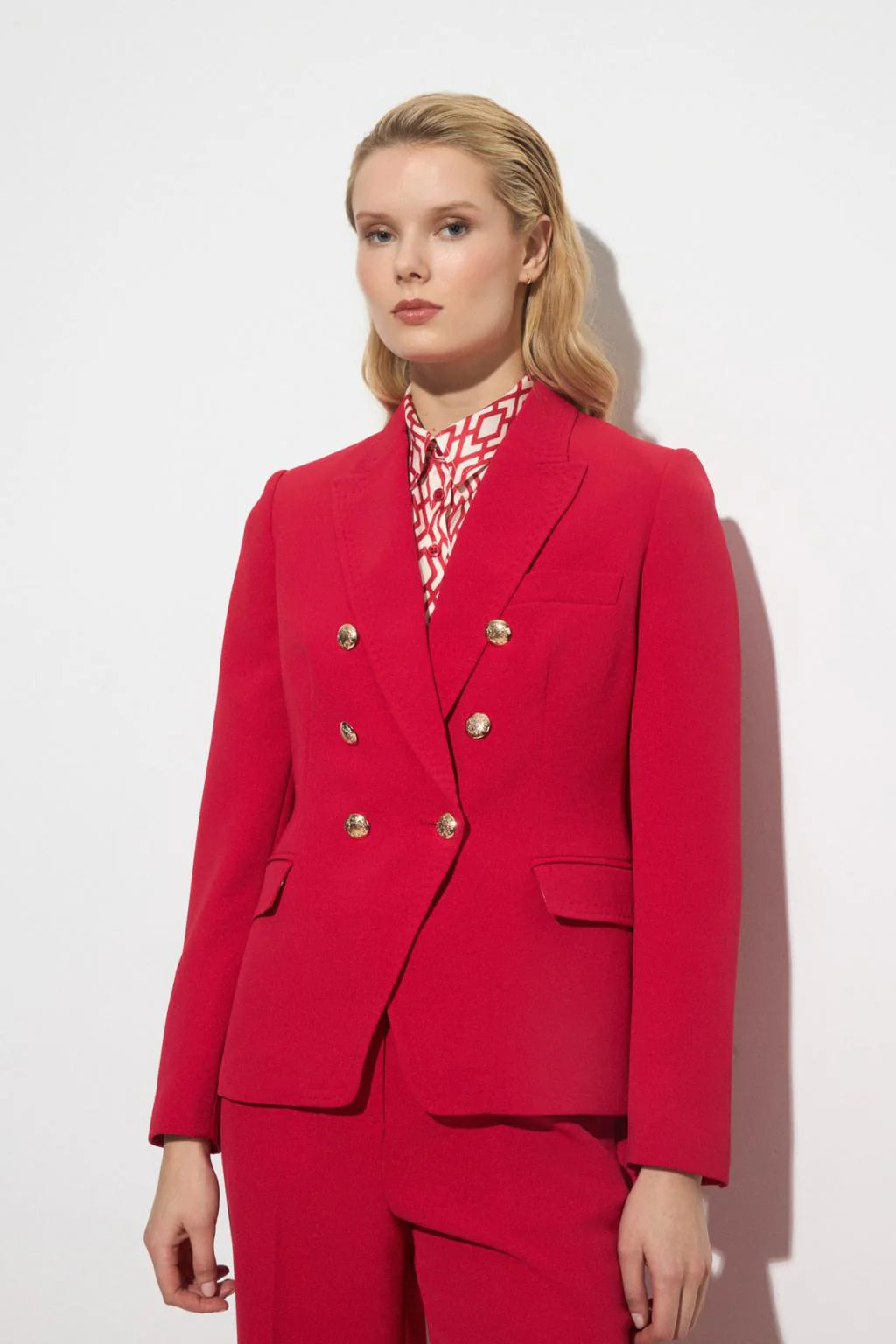 Bariloche Sonseca red double-breasted blazer styled as a suit