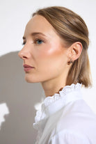 Bariloche Troya white blouse with scalloped openwork collar detail close up