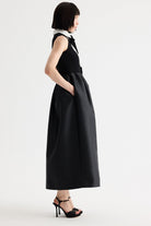 Birelin Couture black and white sleeveless occasion dress with full tulipskirt