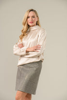 Full outfit view of model in Caroline Kilkenny Gwyneth blouse and trousers