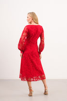Back view of Caroline Kilkenny Iris red floral lace midi dress