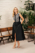 Caroline Kilkenny Jenny black embellished midi dress styled for an evening occasion