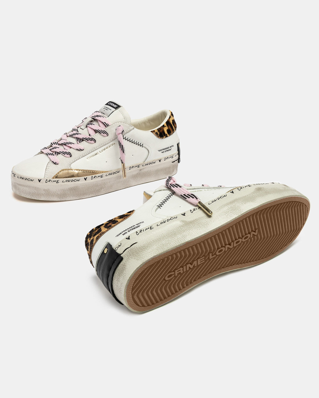 Sole view of Crime London cheetah trainers with pink laces