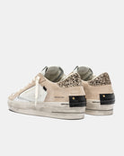 Close-up of glitter heel detail on Crime London trainers