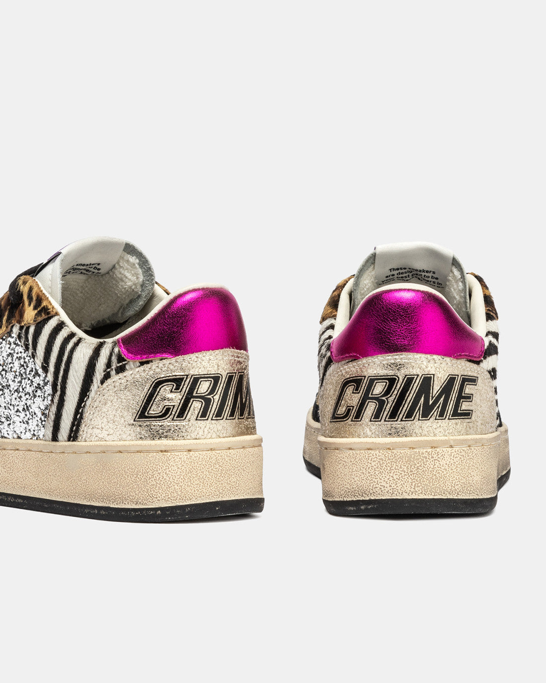 Back view of trainers with fuchsia heel and CRIME logo