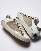 Crime London glitter animal print trainers angled pair view