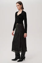 Exquise Linda K green midi skirt – back view with lightweight drape and lining