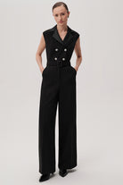 Full-length view of sleeveless black onyx jumpsuit by Exquise styled with formal shoes