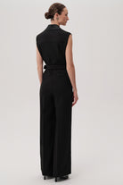 Back view of Exquise Onyx wide-leg black tailored jumpsuit with waist belt