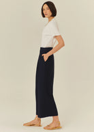 Side view of Exquise Sophie trousers with wide-leg cut and pockets