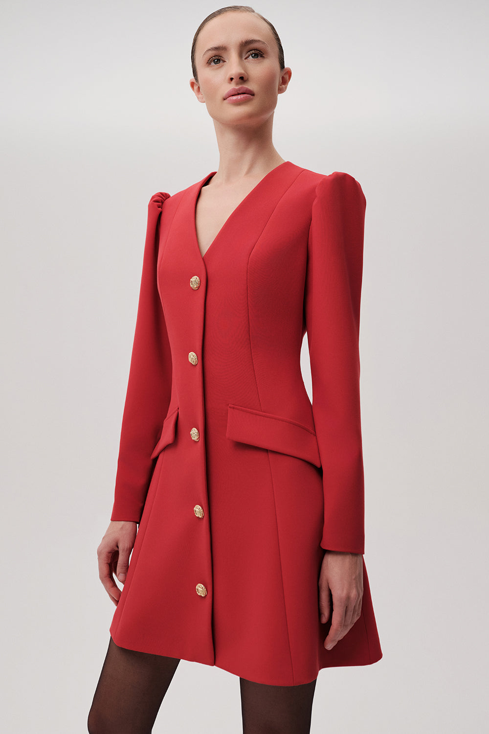 Exquise red V-neck blazer style mini dress with long sleeves – angled view