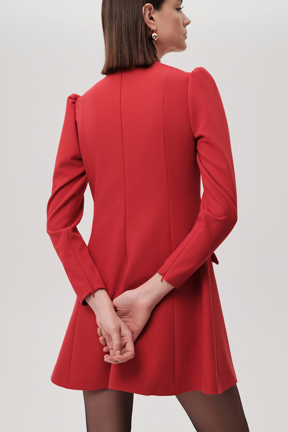 Exquise red dress with back seams and long sleeves – back view
