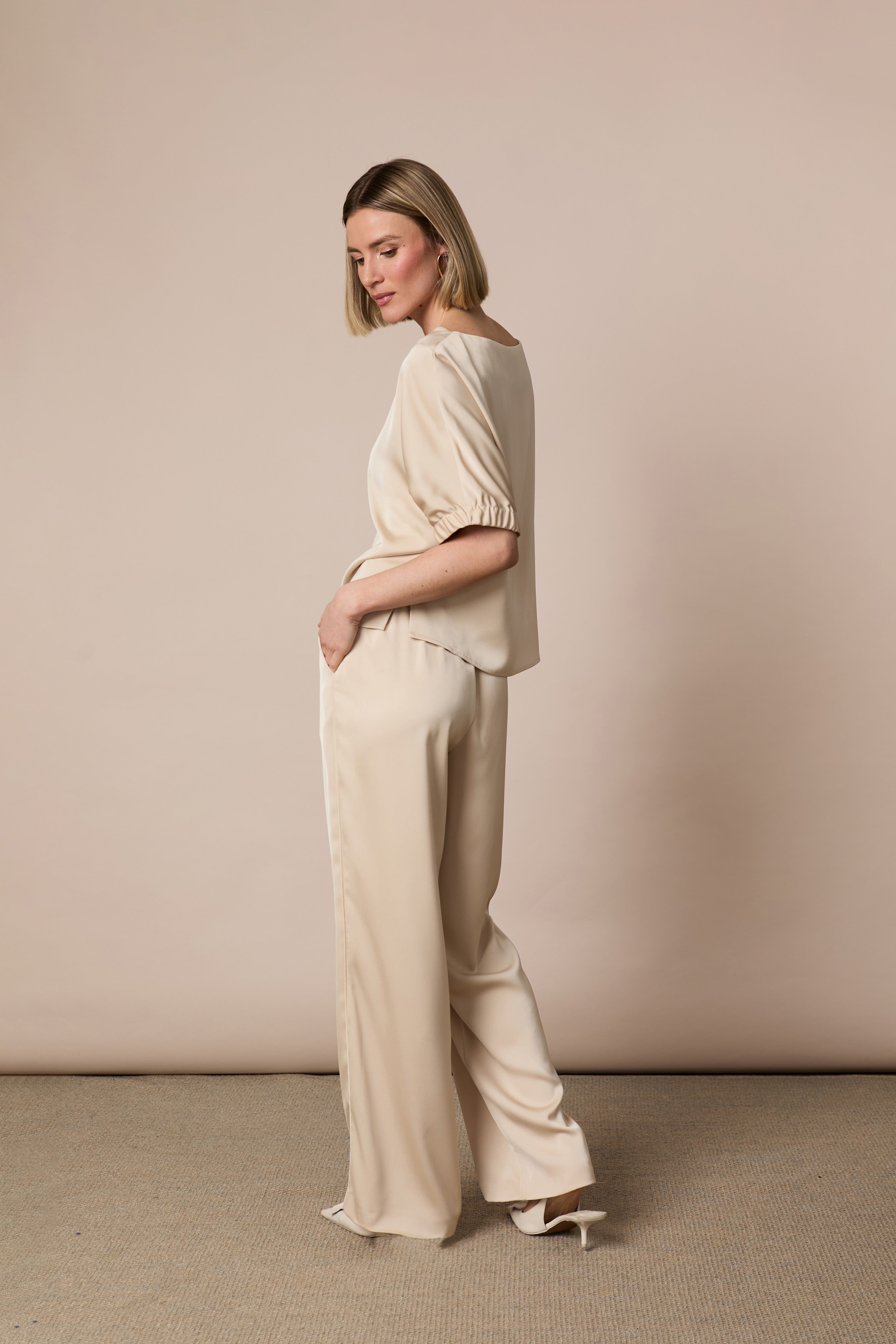     Fee G champagne tailored satin trousers side view with matching top