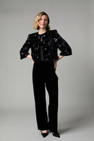Fee G Jade black velvet sequin jacket styled with tailored black trousers