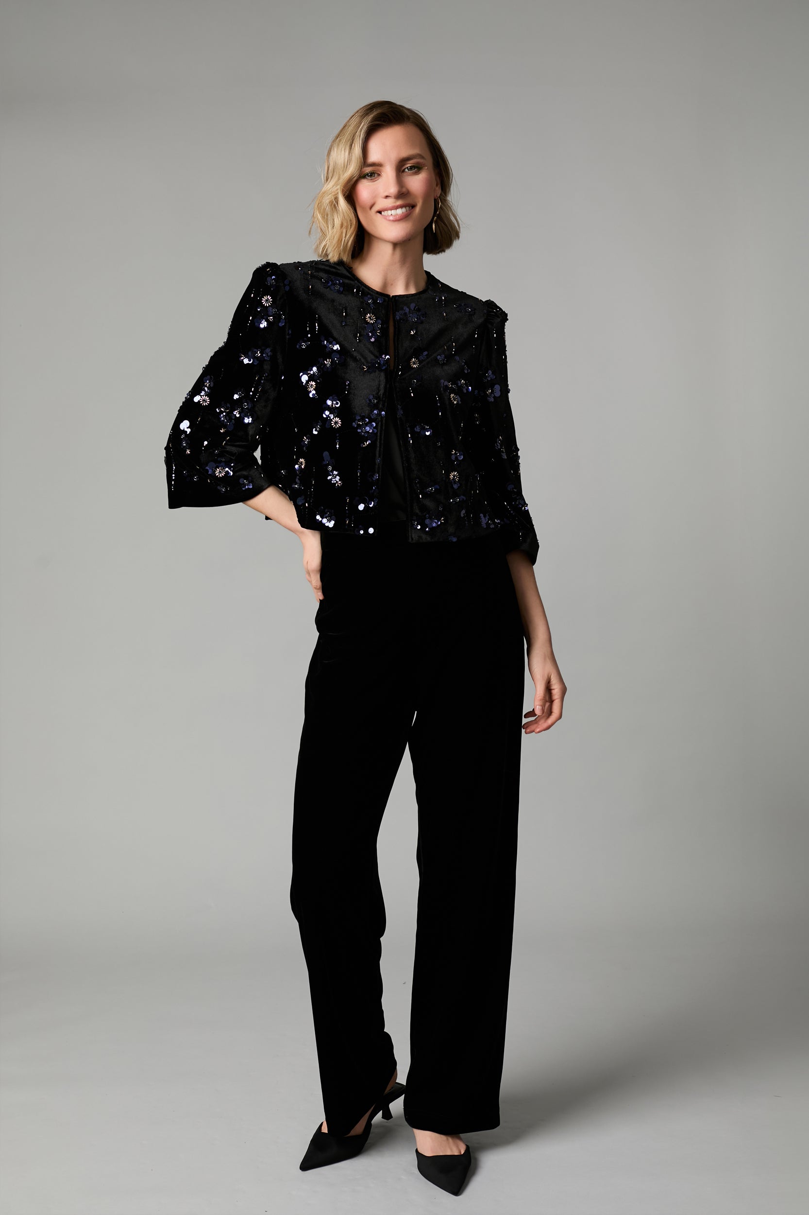 Fee G Jade black velvet occasion jacket styled on model with sequin embellishment